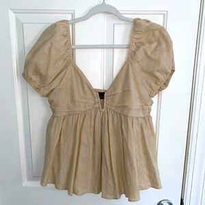 Beige puff sleeve split hem blouse from Mimi and Dottie Boutique